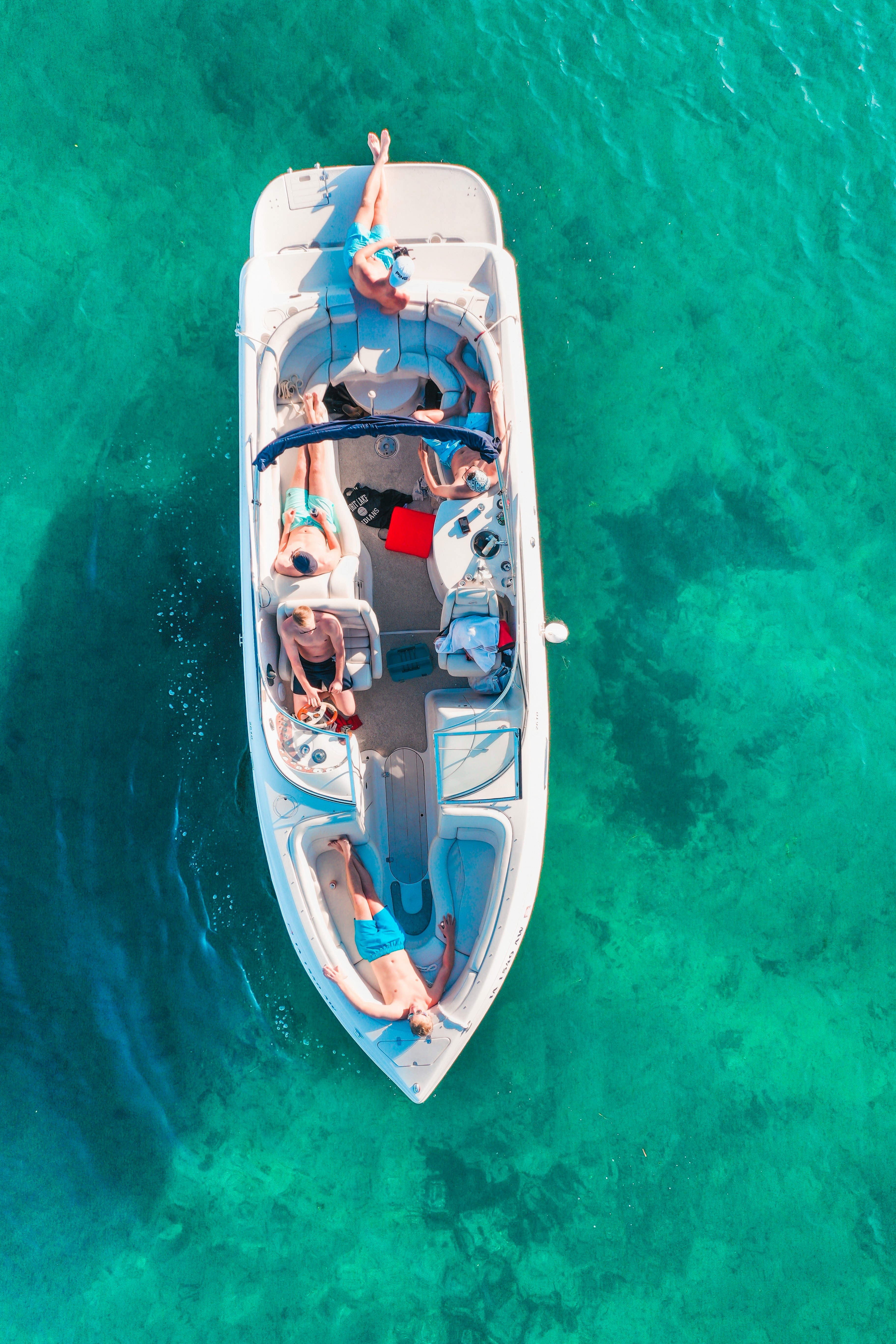 earial view of people on white boat